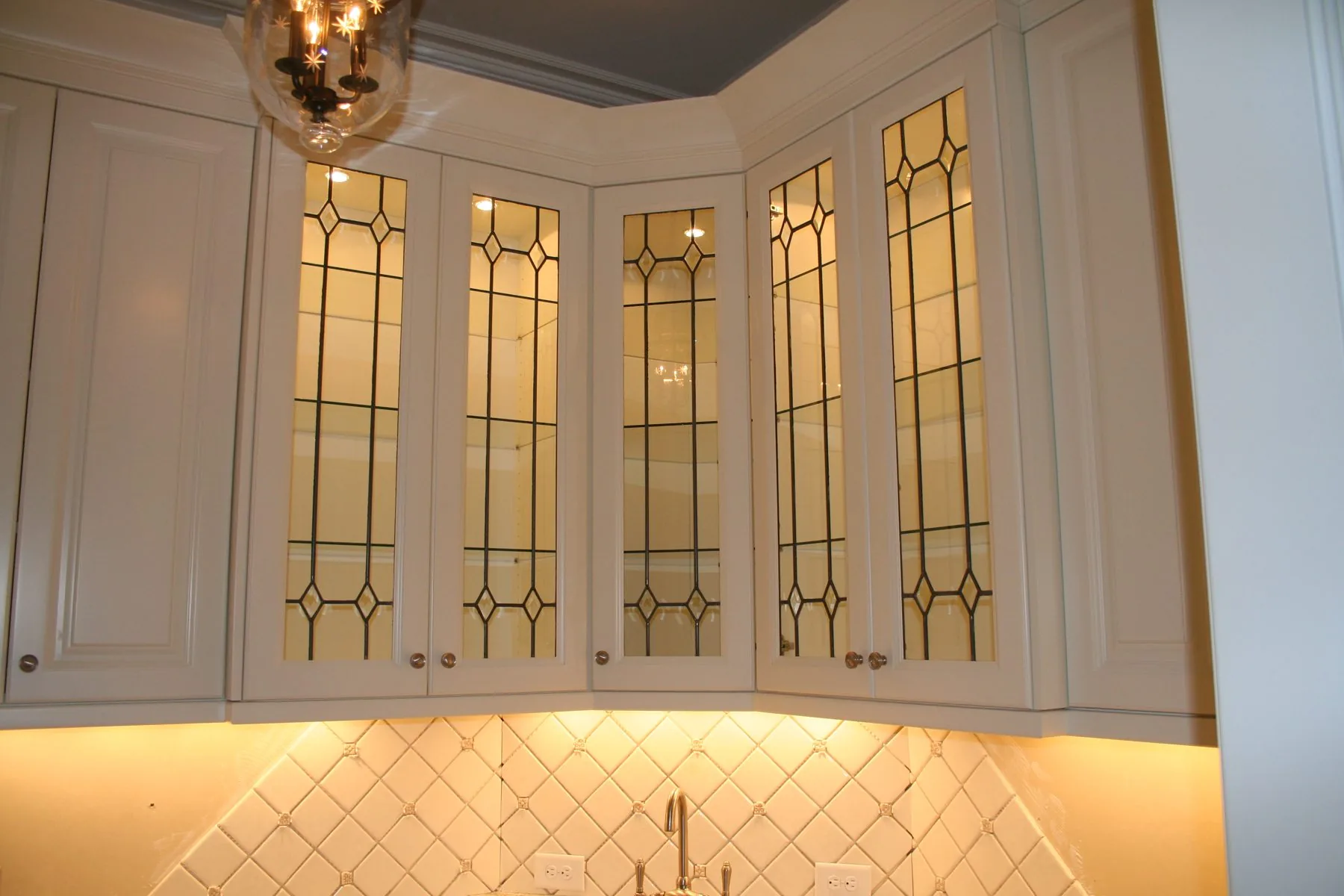 Specialty leaded glass cabinet doors by Distinctive Cabinets